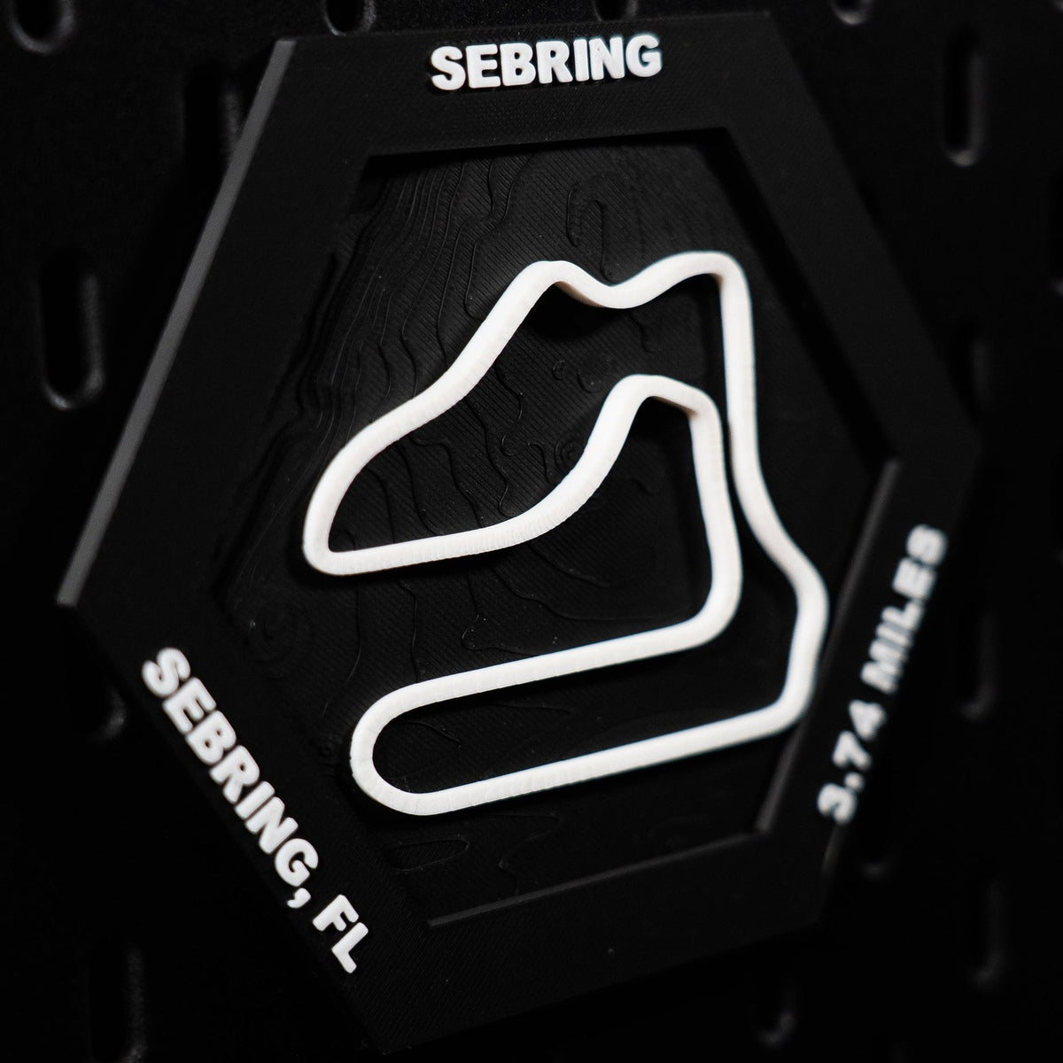 Sebring hex angled, high contrast white lap with both edge inscriptions legible