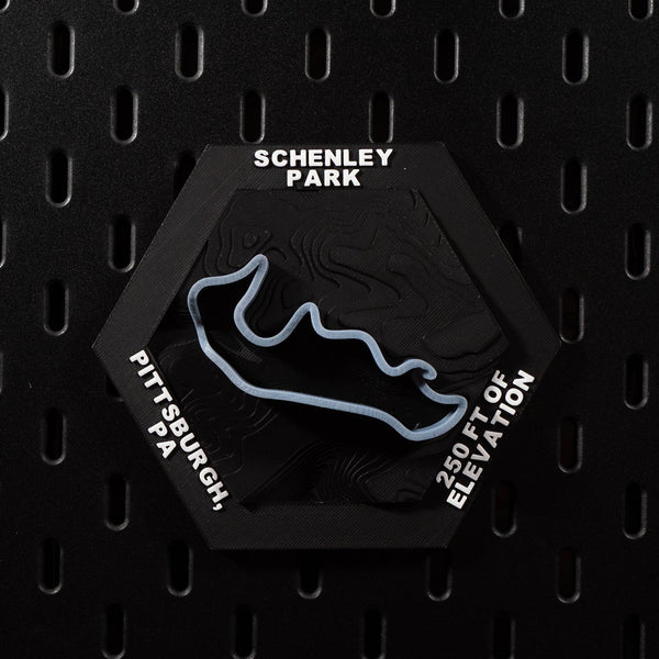 Schenley Park hex flat on black pegboard, pale blue street circuit over terraced terrain