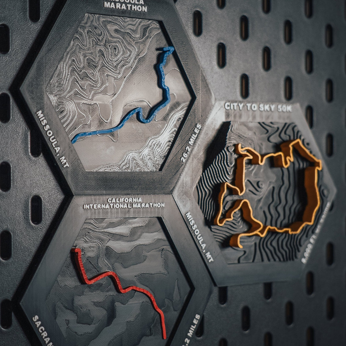 Three custom race route hexes — Missoula Marathon, City to Sky 50K, California International Marathon