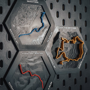 Three custom race route hexes — Missoula Marathon, City to Sky 50K, California International Marathon