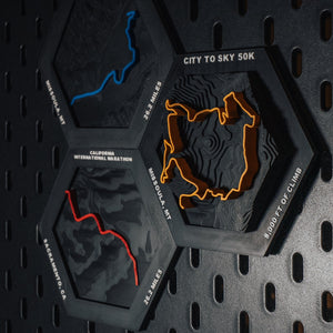 Missoula Marathon, City to Sky 50K and California International Marathon route hexes on pegboard