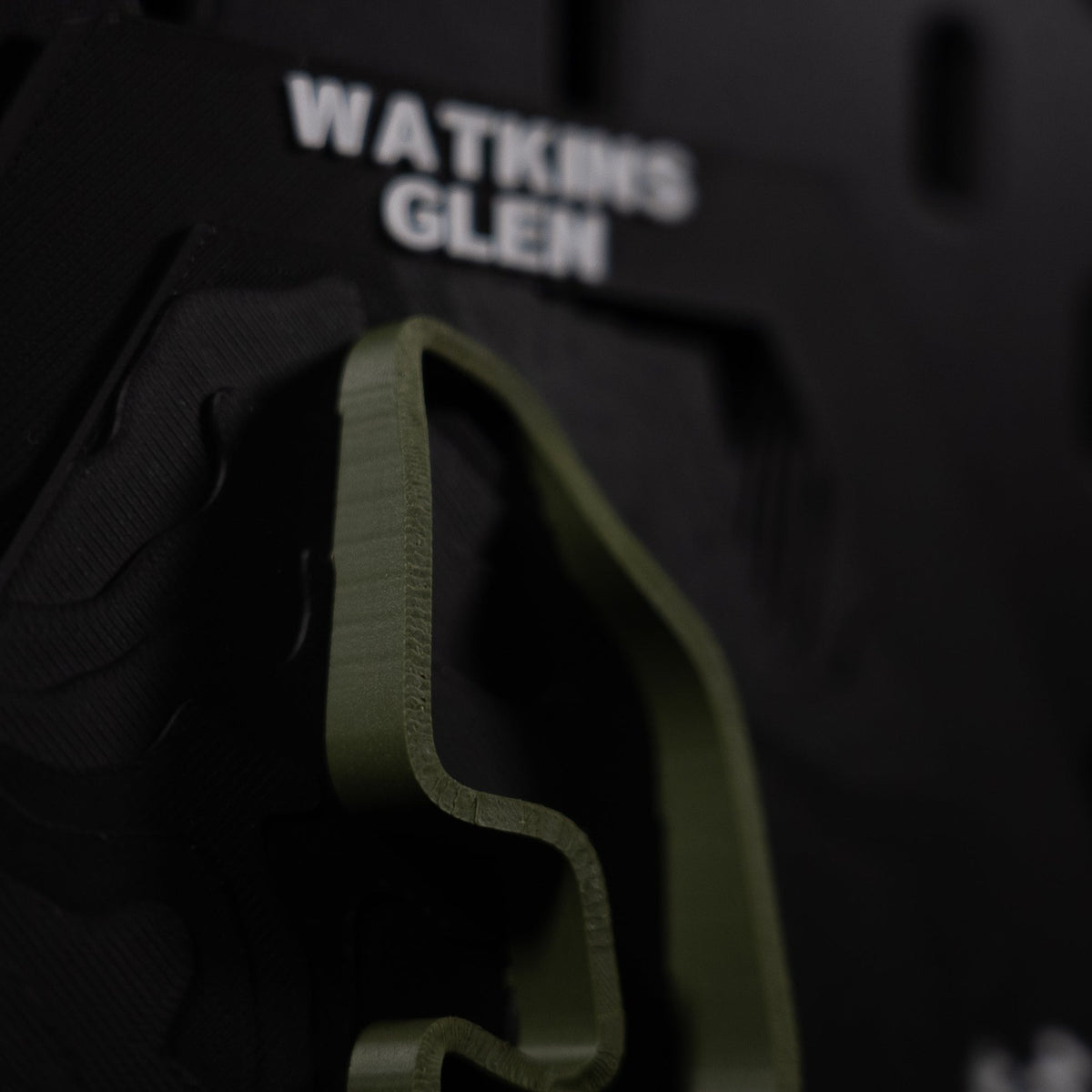 Watkins Glen hex macro, olive ribbon sharp in the foreground with the header behind