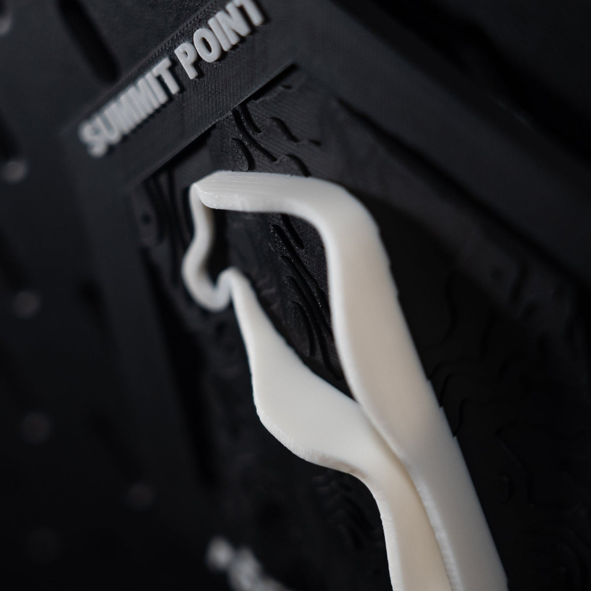 Summit Point hex extreme close up, the white ribbon sweeping out of the top of the frame