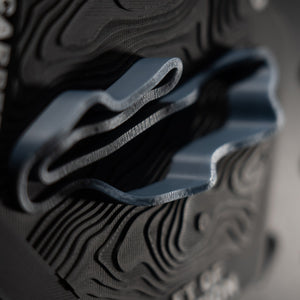 Mugello hex macro, blue ribbon and fine terrain texture beside engraved Scarperia, Italy