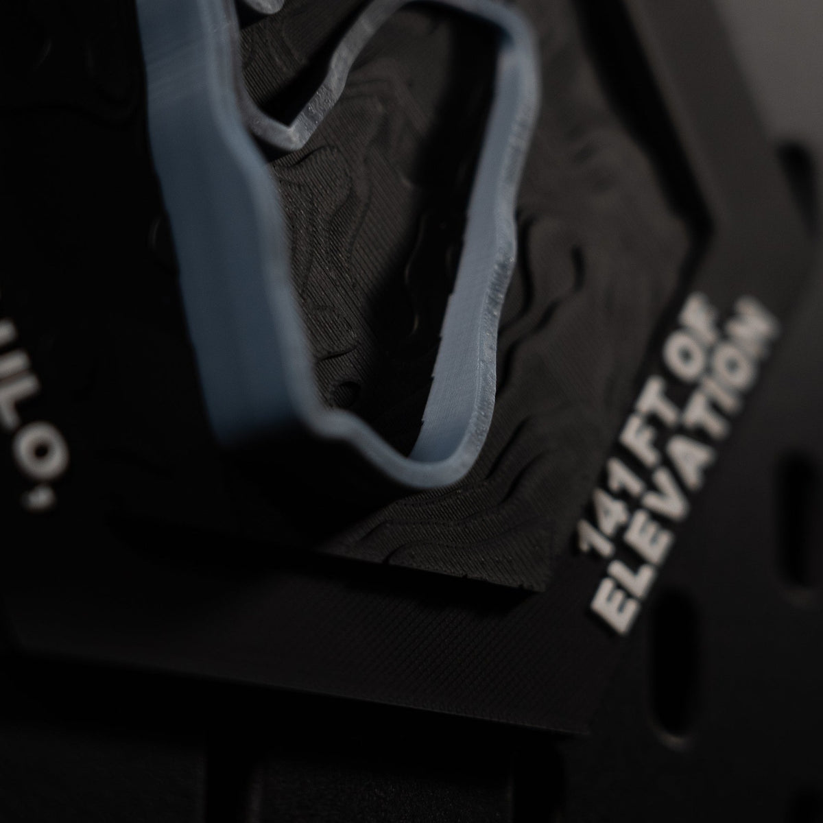 Interlagos hex corner detail, engraved Sao Paulo, Brazil and 141 ft of elevation in white