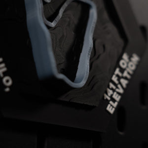 Interlagos hex corner detail, engraved Sao Paulo, Brazil and 141 ft of elevation in white