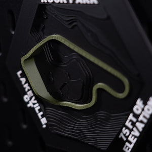 Lime Rock Park hex cropped tight on the olive loop and its long sweeping back straight
