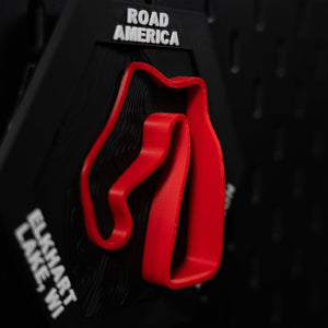 Road America hex angled close, tall red ribbon above engraved Elkhart Lake, WI