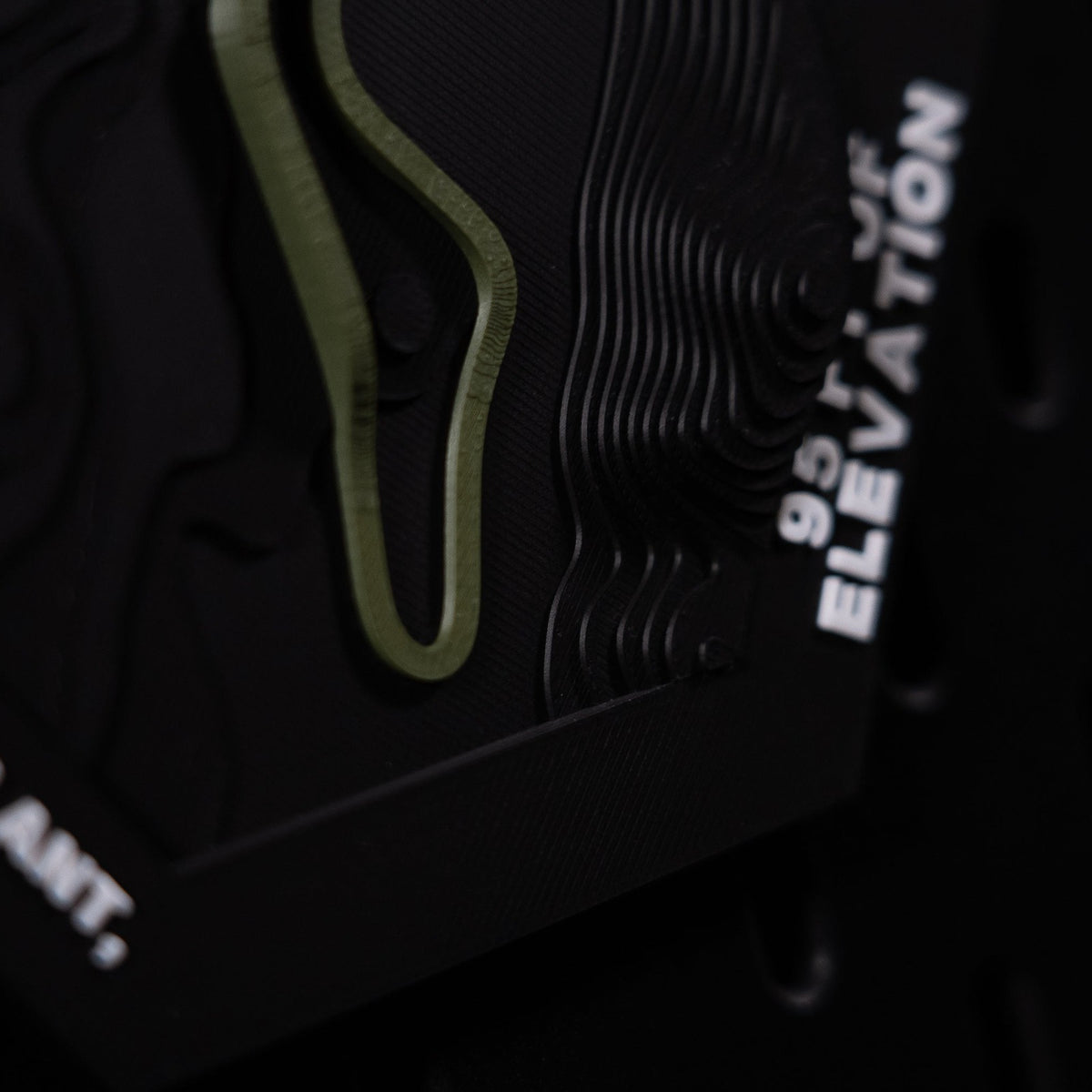 Mont-Tremblant hex corner detail, olive track beside stacked contour steps and 95 ft engraved