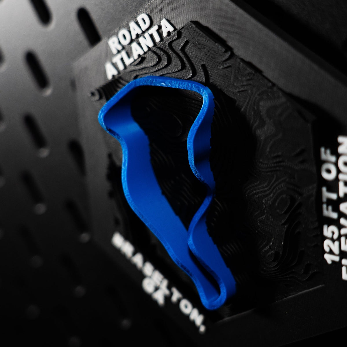 Road Atlanta hex three quarter view, full blue lap and the engraved 125 ft of elevation