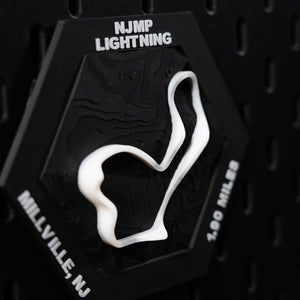 NJMP Lightning hex three quarter view, white loop above engraved Millville, NJ