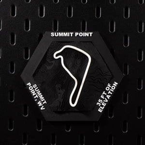 Summit Point hex flat on black pegboard, white circuit loop over near flat black terrain