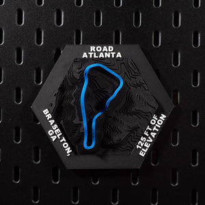 Road Atlanta hex flat on black pegboard, blue circuit loop raised over black contour terrain